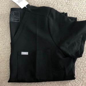 Figs scrub top (AYA Healthcare logo on sleeve). Never worn